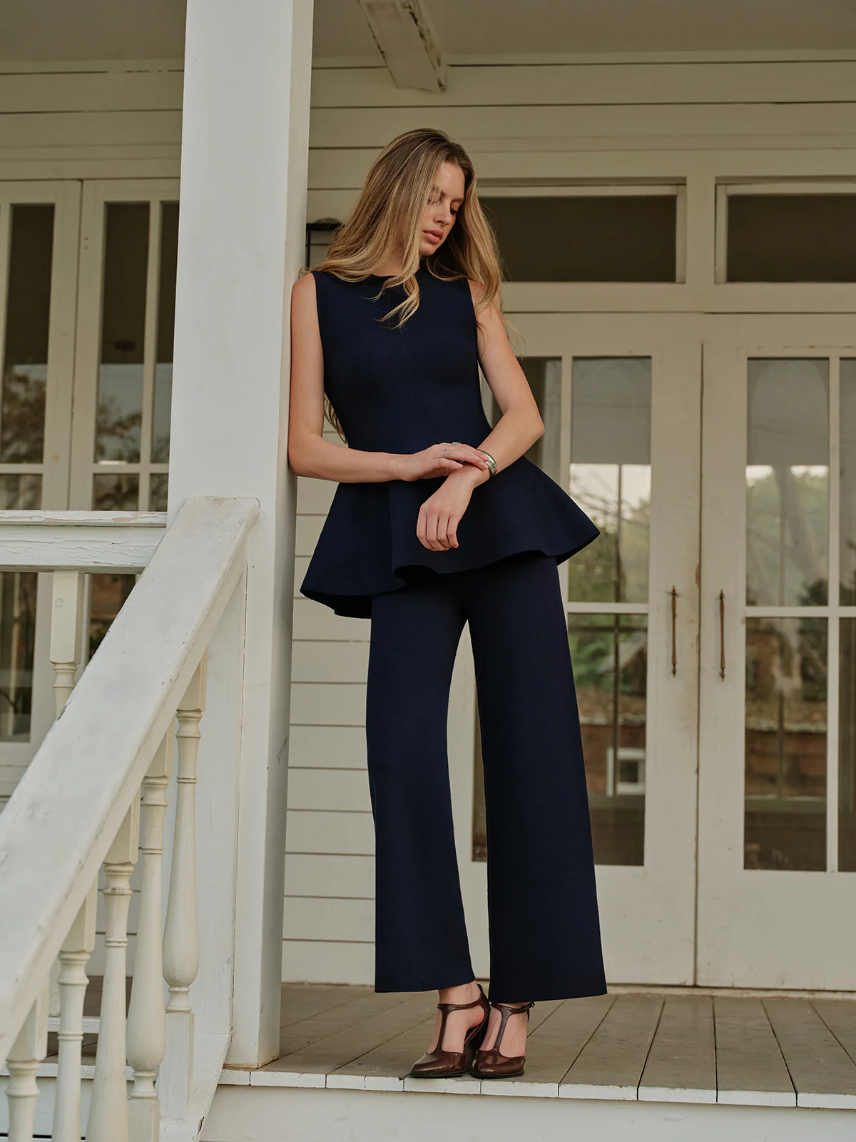 Flared Hem Sleeveless Knit Top - Takermore